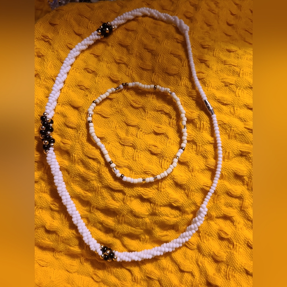 WHITE SEED BEADED BLACK AND GOLD NECKLACE AND BRACELET SET!